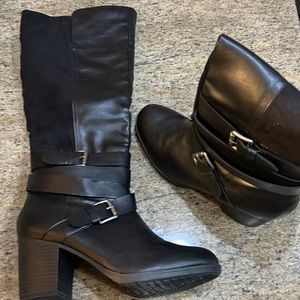 Black faux leather and suede boots.